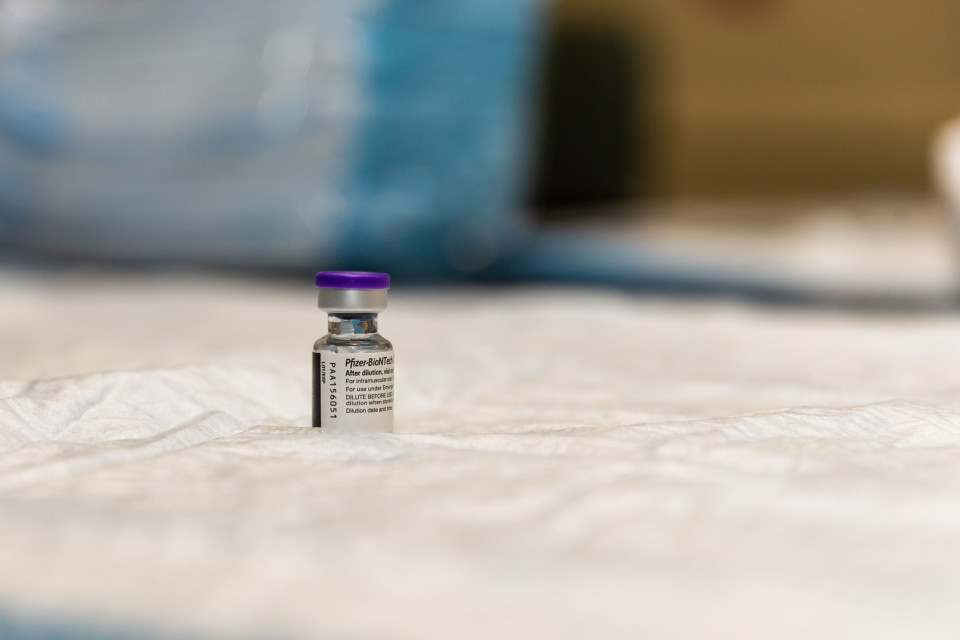 A vial of the Pfizer-BioNTech COVID-19 mRNA vaccine prepared for distribution in December 2020.